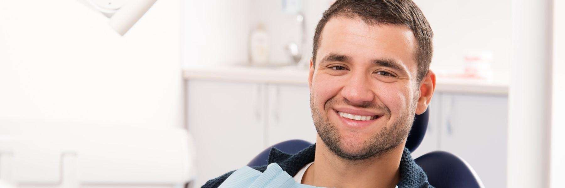 Man visiting the dentist | tooth colored fillings Fort Collins