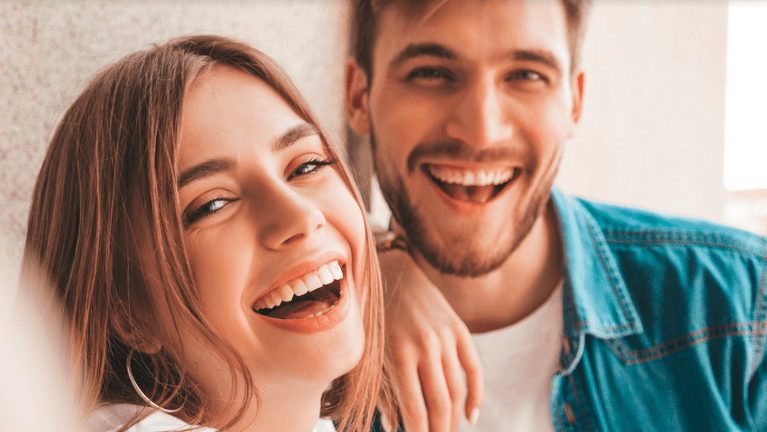 Two people laughing | Dentist Fort Collins