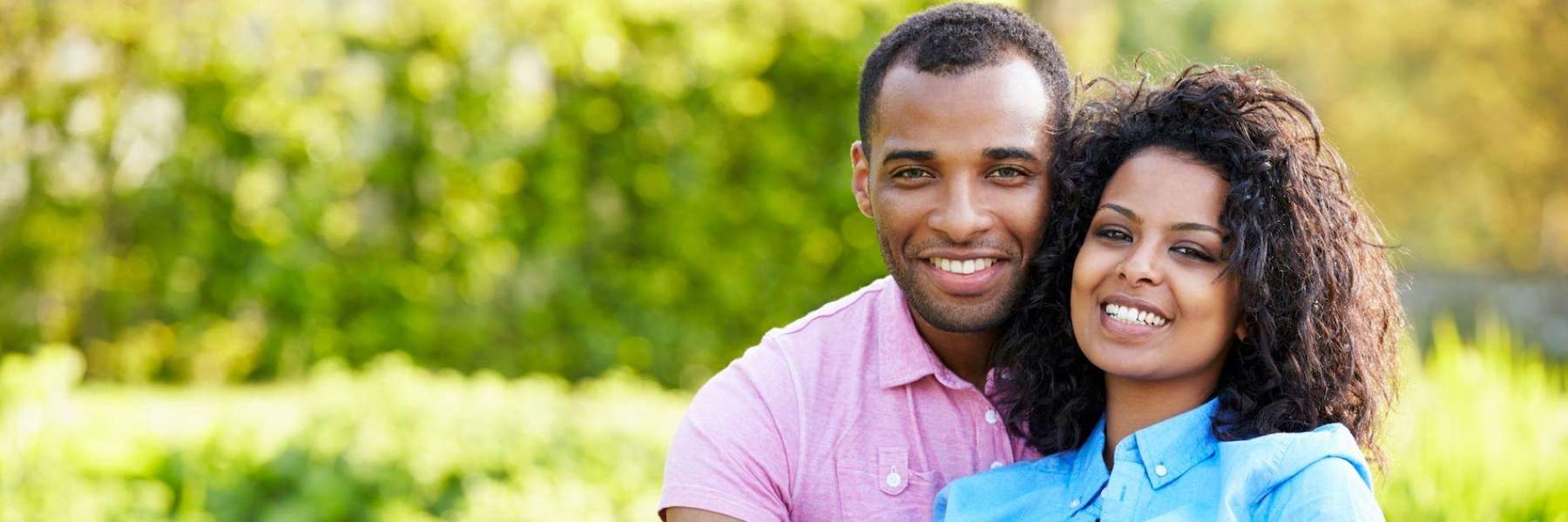 Black man and woman smiling together outside, fort collins co