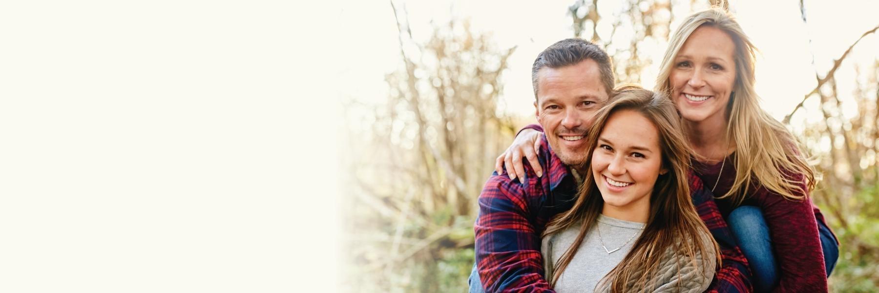 family smiling after their dental services, fort collins co