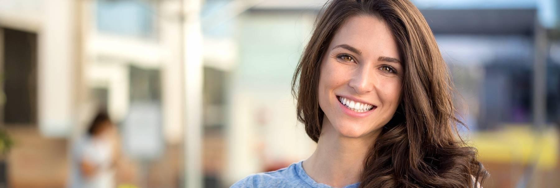 woman smiling after teeth whitening, Fort Collins CO
